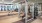 fitness center with large open spaces allowing room for workouts and for using equipment